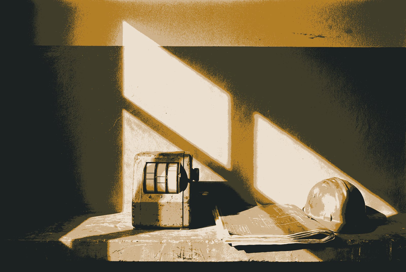 A worn mechanical tally counter, like an old taxi meter, standing beside a folded set of drawings and a hard hat, with a strong diagonal shadow behind.